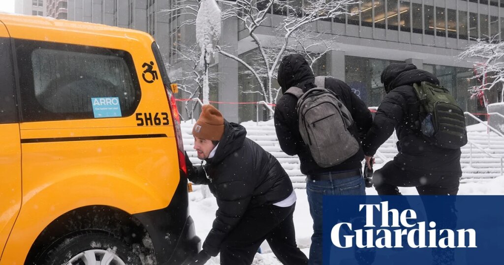 Millions under road travel bans as blizzard conditions slam US north-east | US weather